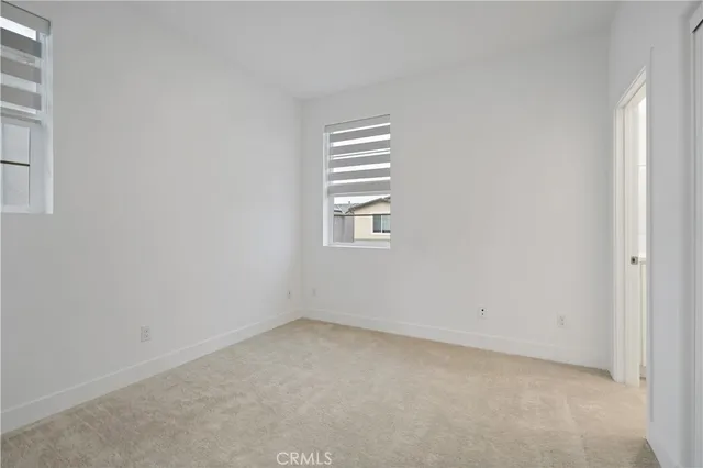 a view of a hallway with closet