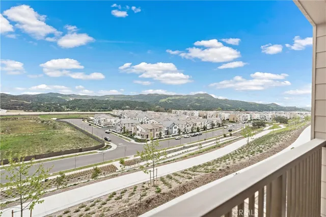 a view of balcony with furniture