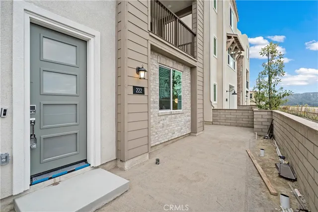 a view of balcony with furniture