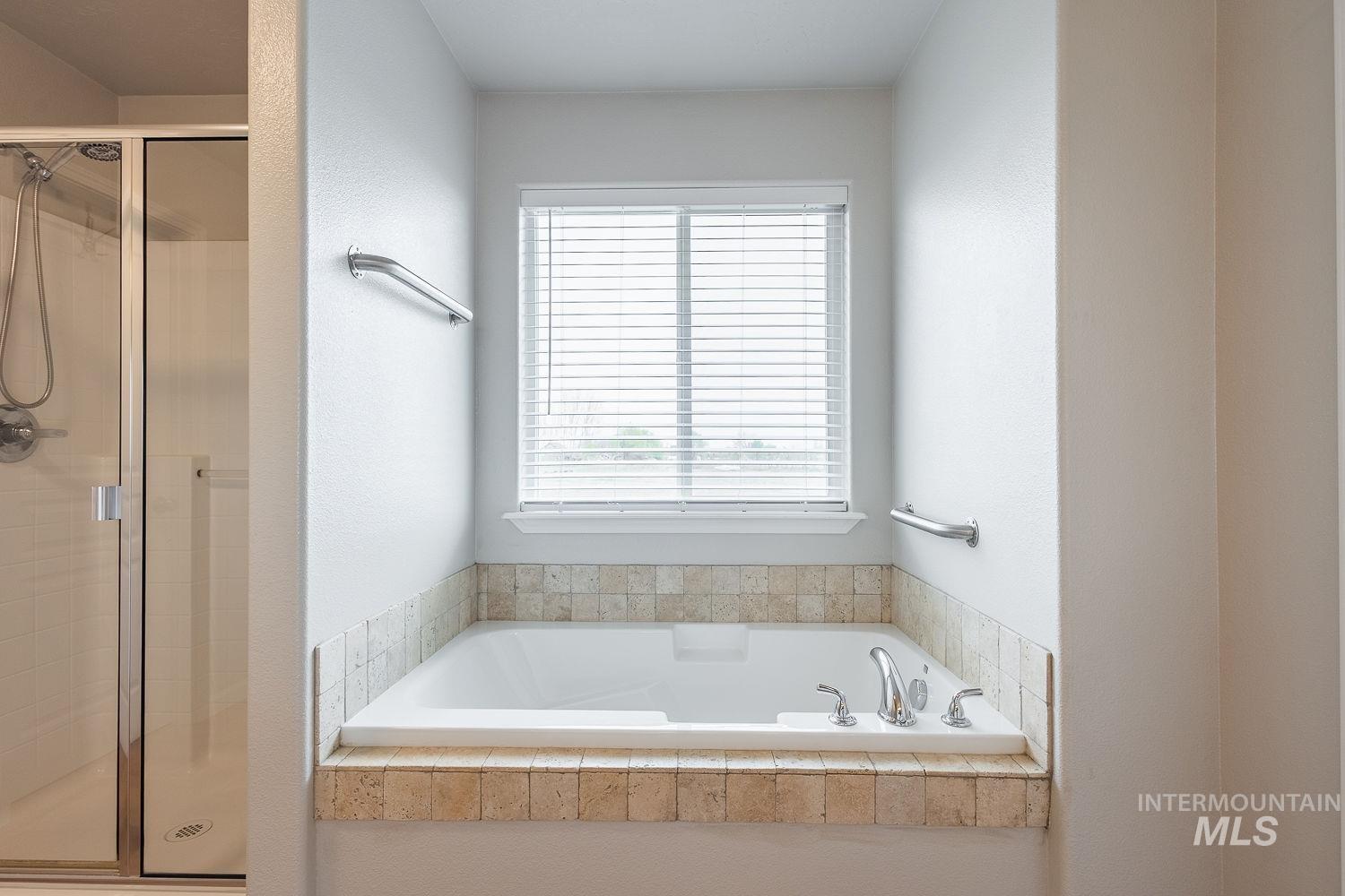 2515 Fallcrest Street Caldwell, ID 83607 - Photo 28 of 48 Bathroom with a shower stall and a garden tub