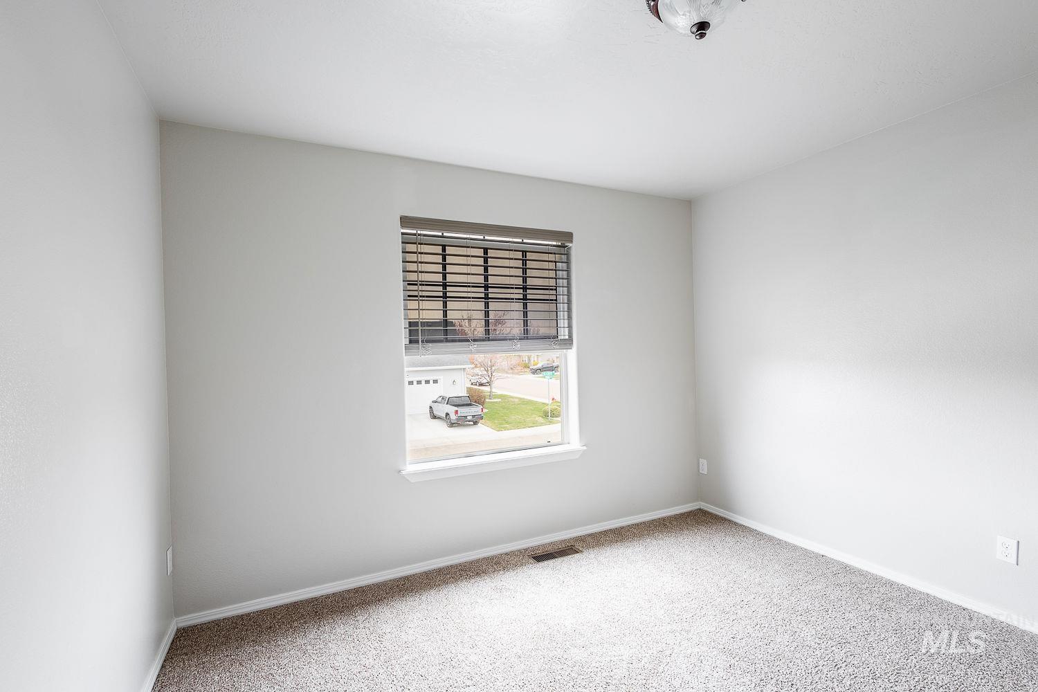 2515 Fallcrest Street Caldwell, ID 83607 - Photo 33 of 48 Unfurnished room with light colored carpet and baseboards