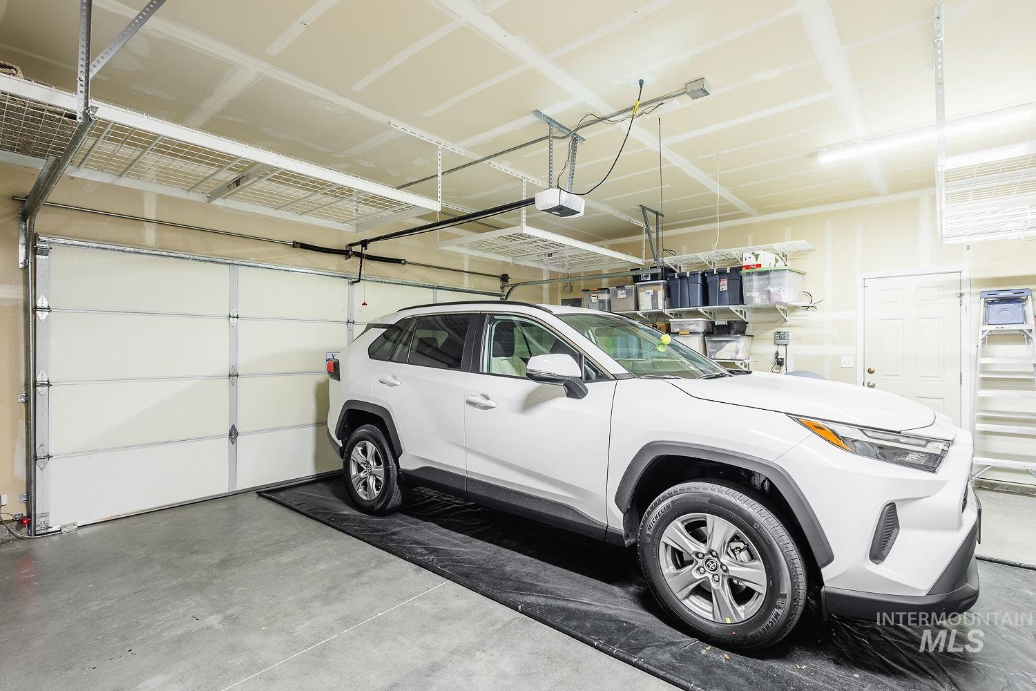 2515 Fallcrest Street Caldwell, ID 83607 - Photo 40 of 48 Garage featuring a garage door opener