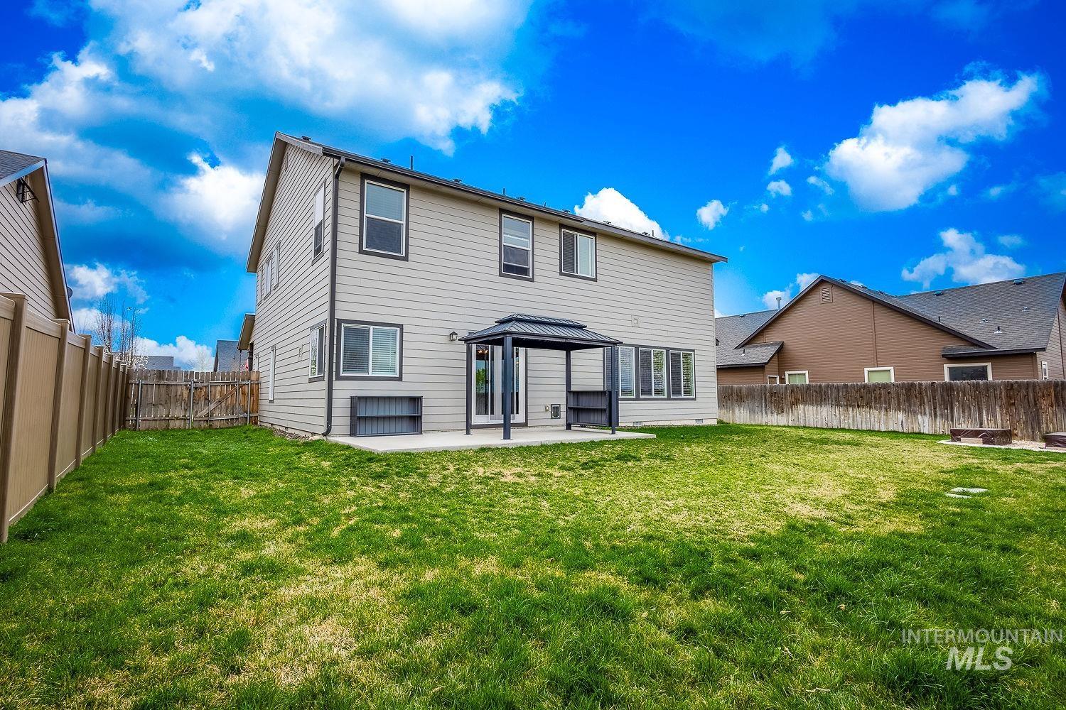 2515 Fallcrest Street Caldwell, ID 83607 - Photo 44 of 48 Back of house featuring a gazebo, a patio area, and a fenced backyard