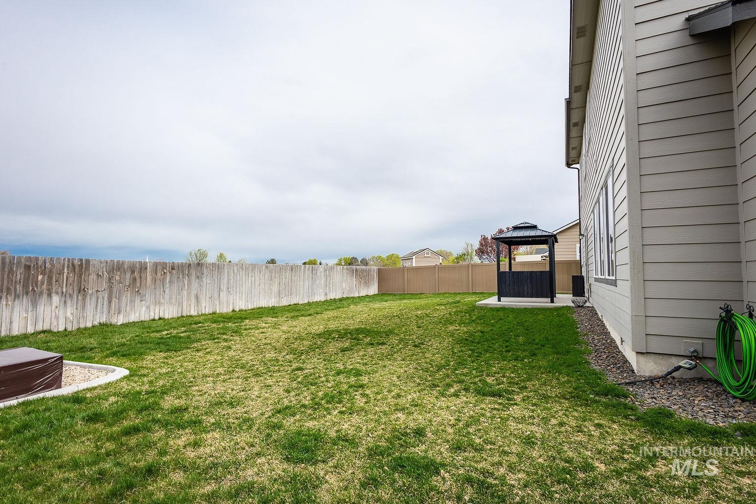 2515 Fallcrest Street Caldwell, ID 83607 - Photo 45 of 48 Fenced backyard with a patio area and a gazebo