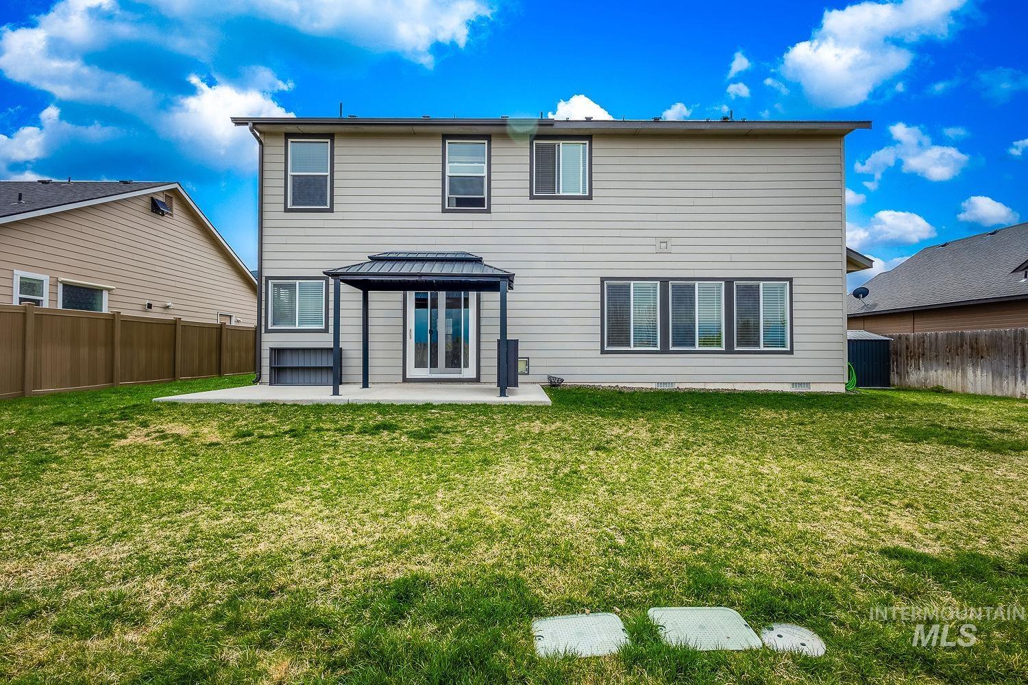 2515 Fallcrest Street Caldwell, ID 83607 - Photo 47 of 48 Back of property with a fenced backyard, a patio, a gazebo, and crawl space