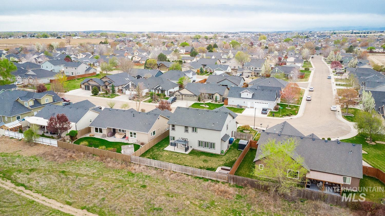 2515 Fallcrest Street Caldwell, ID 83607 - Photo 5 of 48 Aerial perspective of suburban area