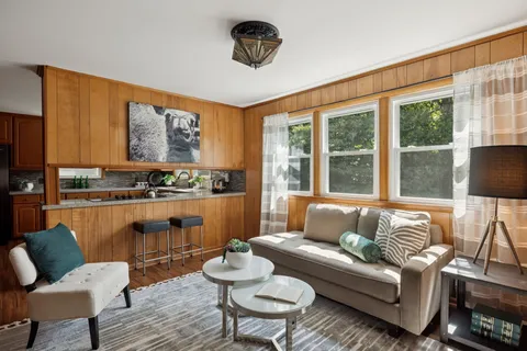 a kitchen with stainless steel appliances granite countertop a refrigerator and sink