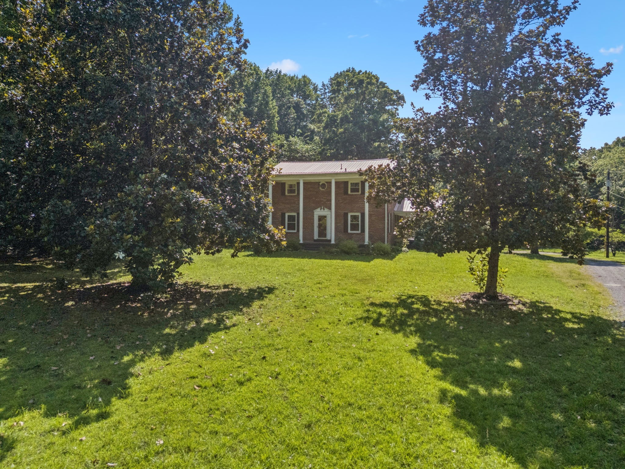 7199 Harper Road Joelton, TN 37080 - Photo 3 of 56 a view of a house with a yard