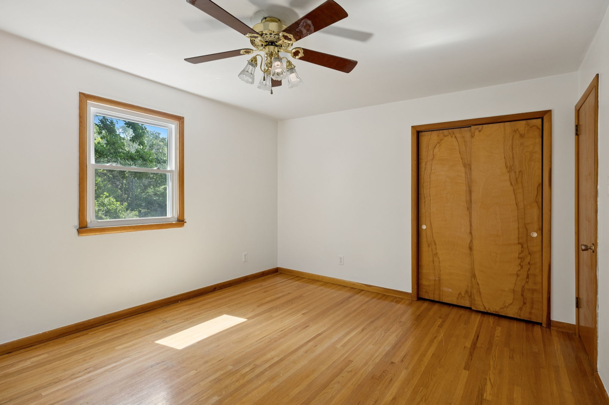 7199 Harper Road Joelton, TN 37080 - Photo 31 of 56 a view of an empty room with wooden floor and a window