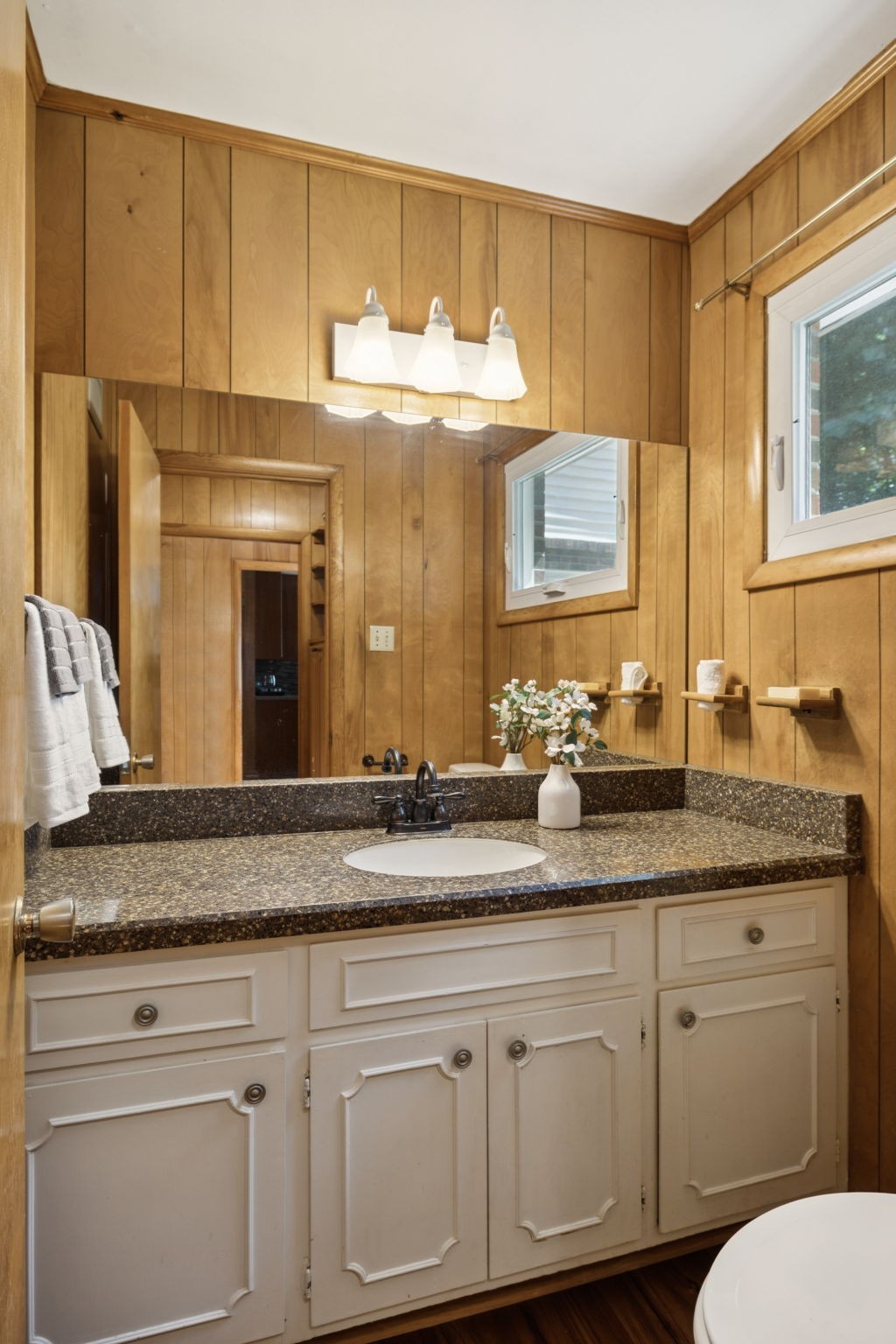 7199 Harper Road Joelton, TN 37080 - Photo 36 of 56 a bathroom with a granite countertop sink and a mirror