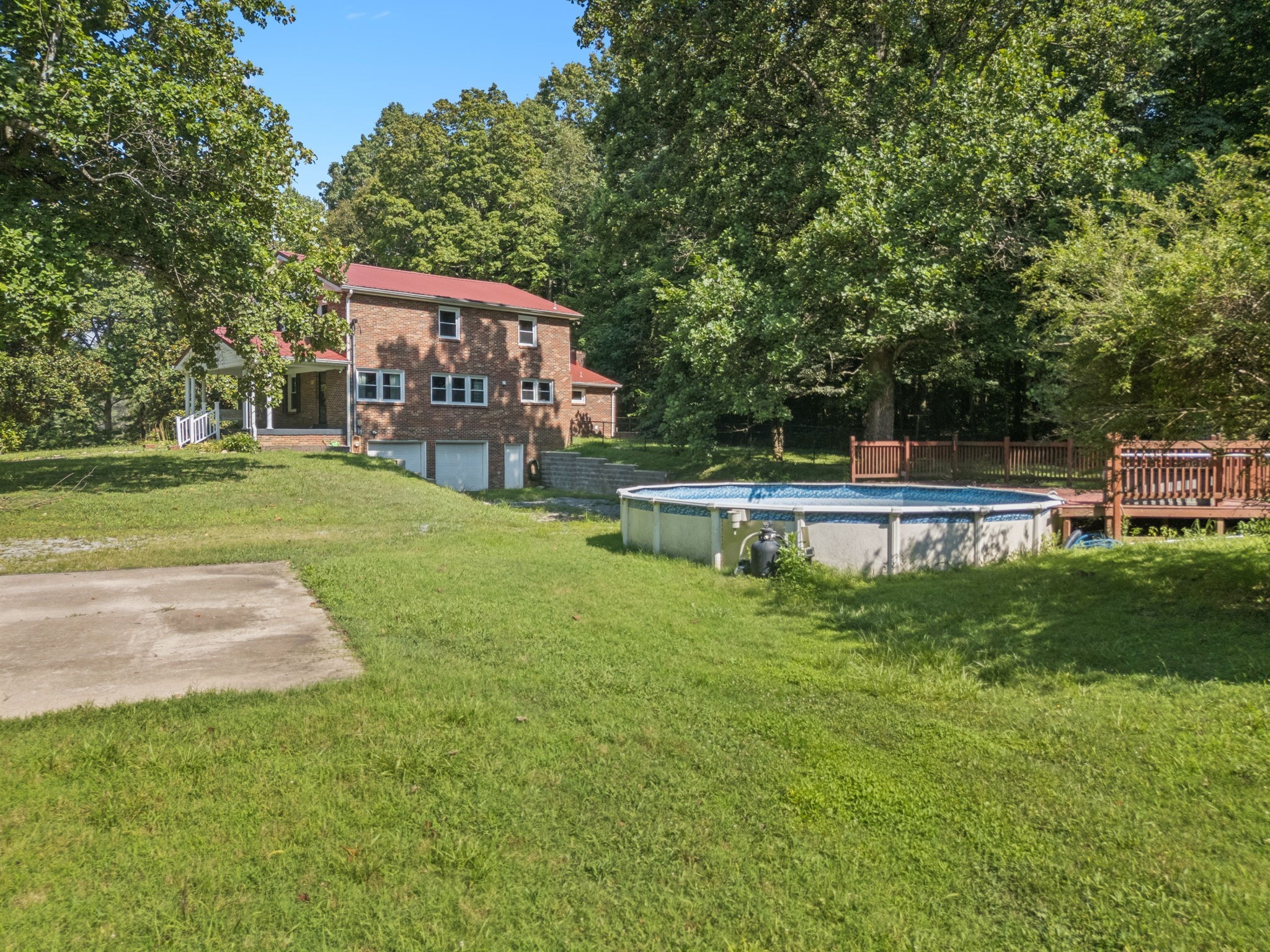 7199 Harper Road Joelton, TN 37080 - Photo 43 of 56 a view of a house with a big yard and large trees