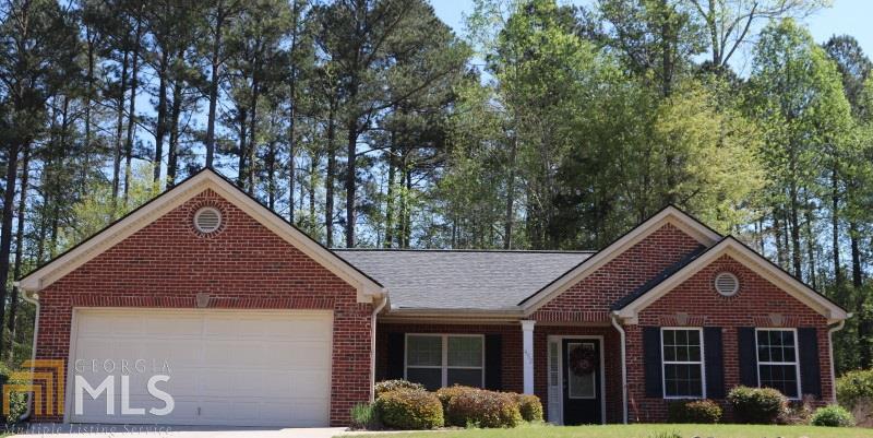 452 Red Bud Road Jefferson, GA 30549 - Photo 1 of 1 a front view of a house with garden