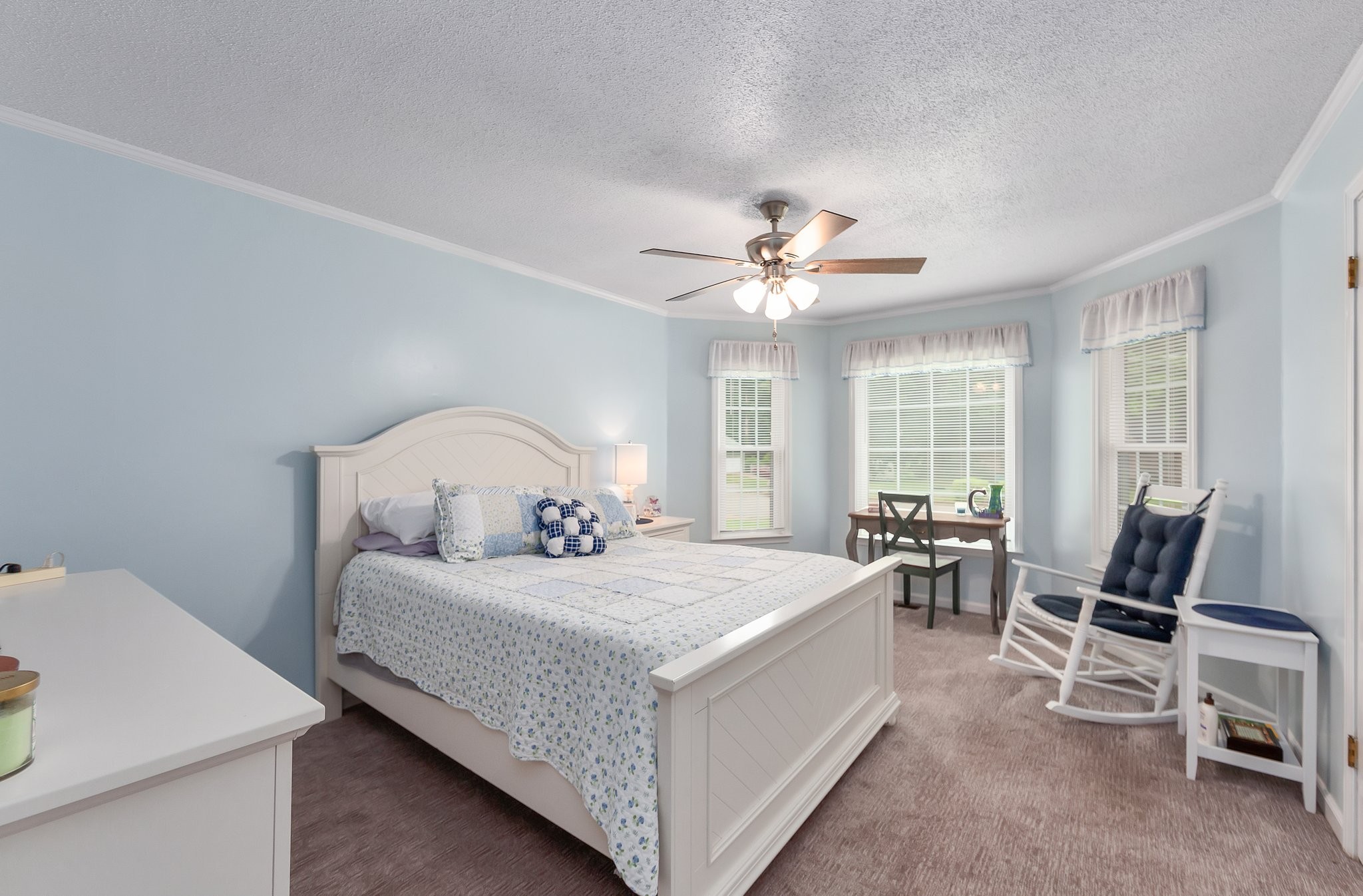 62 Ridgeoak Place Jackson, TN 38305 - Photo 21 of 32 a bedroom with a bed a table and chair