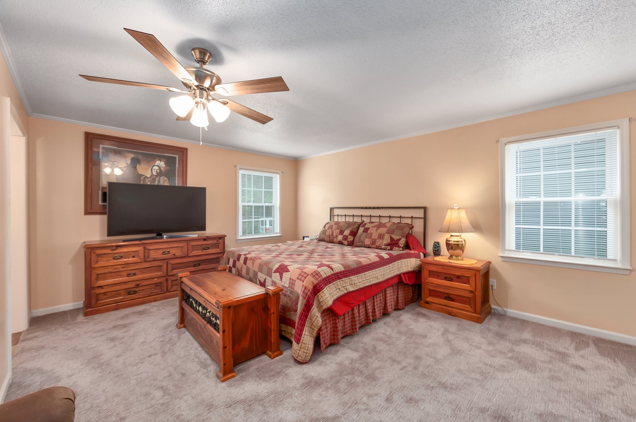 62 Ridgeoak Place Jackson, TN 38305 - Photo 24 of 32 a bedroom with a bed and a flat screen tv