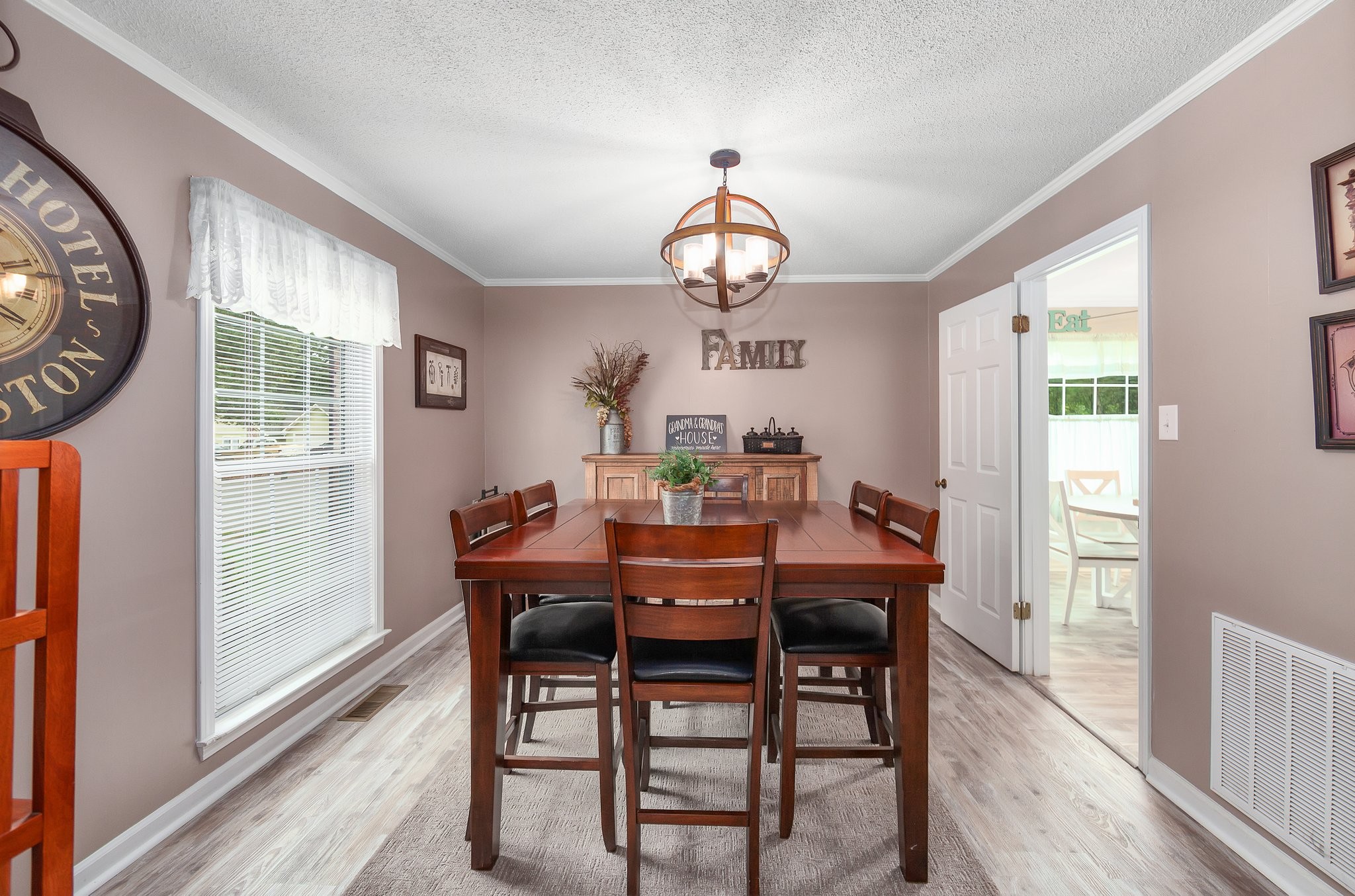 62 Ridgeoak Place Jackson, TN 38305 - Photo 8 of 32 a view of a dining room with furniture window and wooden floor