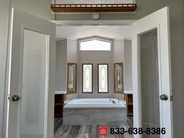 a bathroom with a bathtub and a sink