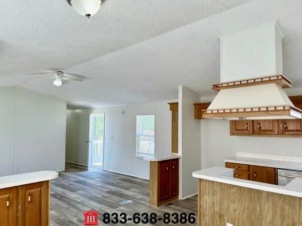 a view of kitchen and utility room