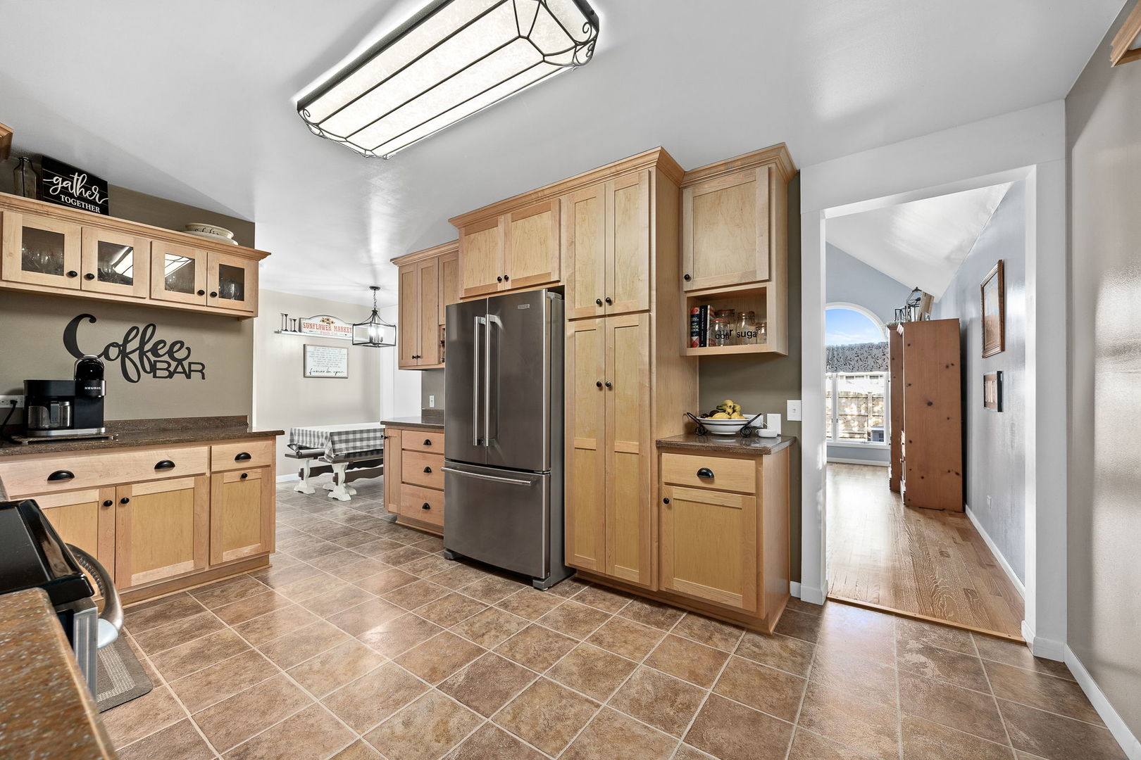 3560 Bass Court Morris, IL 60450 - Photo 5 of 34 a kitchen with stainless steel appliances granite countertop a refrigerator and a stove top oven
