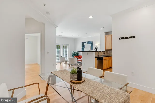 a kitchen with dining table and appliances