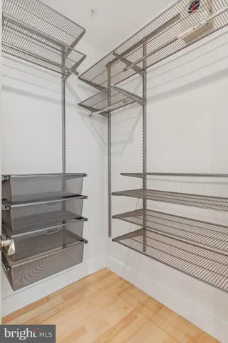 a view of a room with racks on the wall