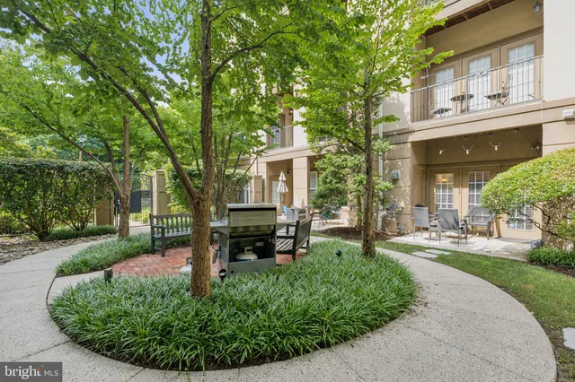 front view of a house with a garden
