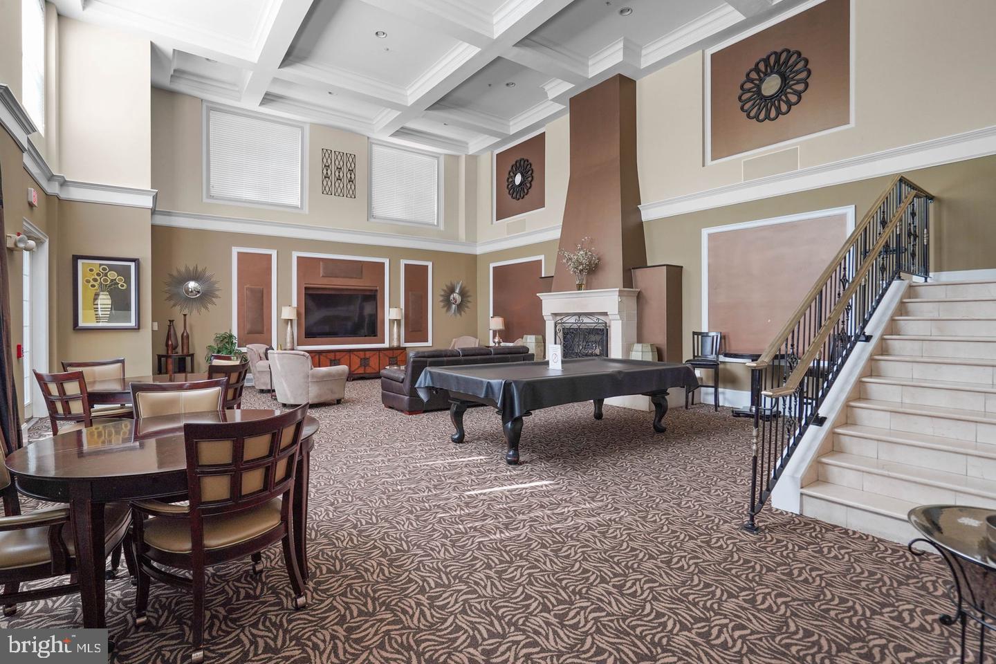 11800 Old Georgetown Road, Unit 1120 North Bethesda, MD 20852 - Photo 32 of 36 a living room with furniture and a rug
