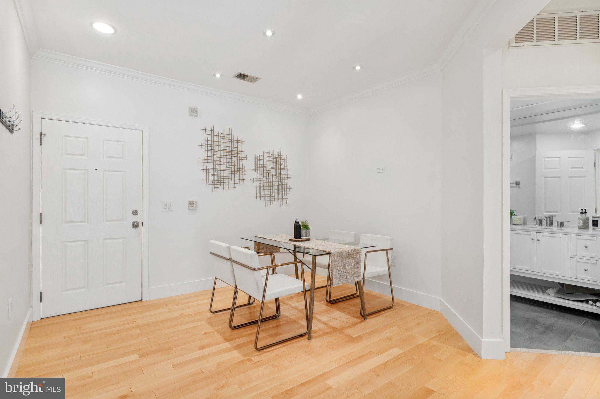 11800 Old Georgetown Road, Unit 1120 North Bethesda, MD 20852 - Photo 10 of 36 a view of a room with furniture and wooden floor