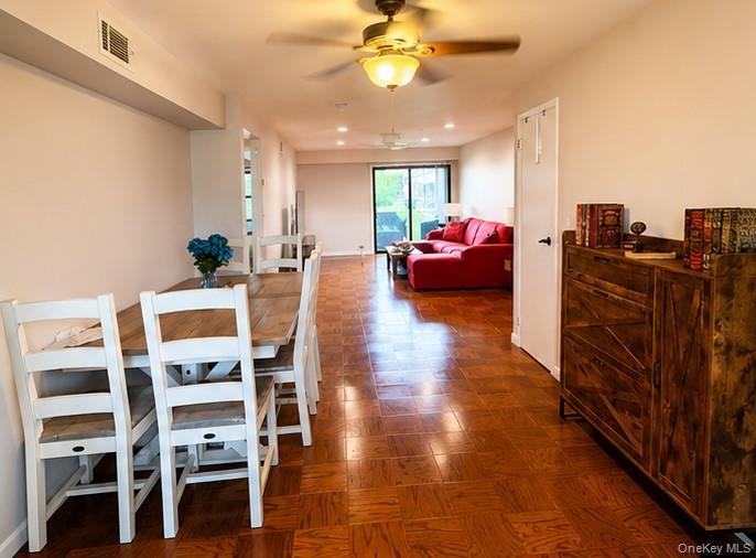 335 Mariners Way Copiague, NY 11726 - Photo 5 of 12 a living room with furniture and natural light