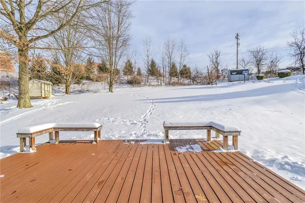 a view of a terrace with wooden floor and outdoor space