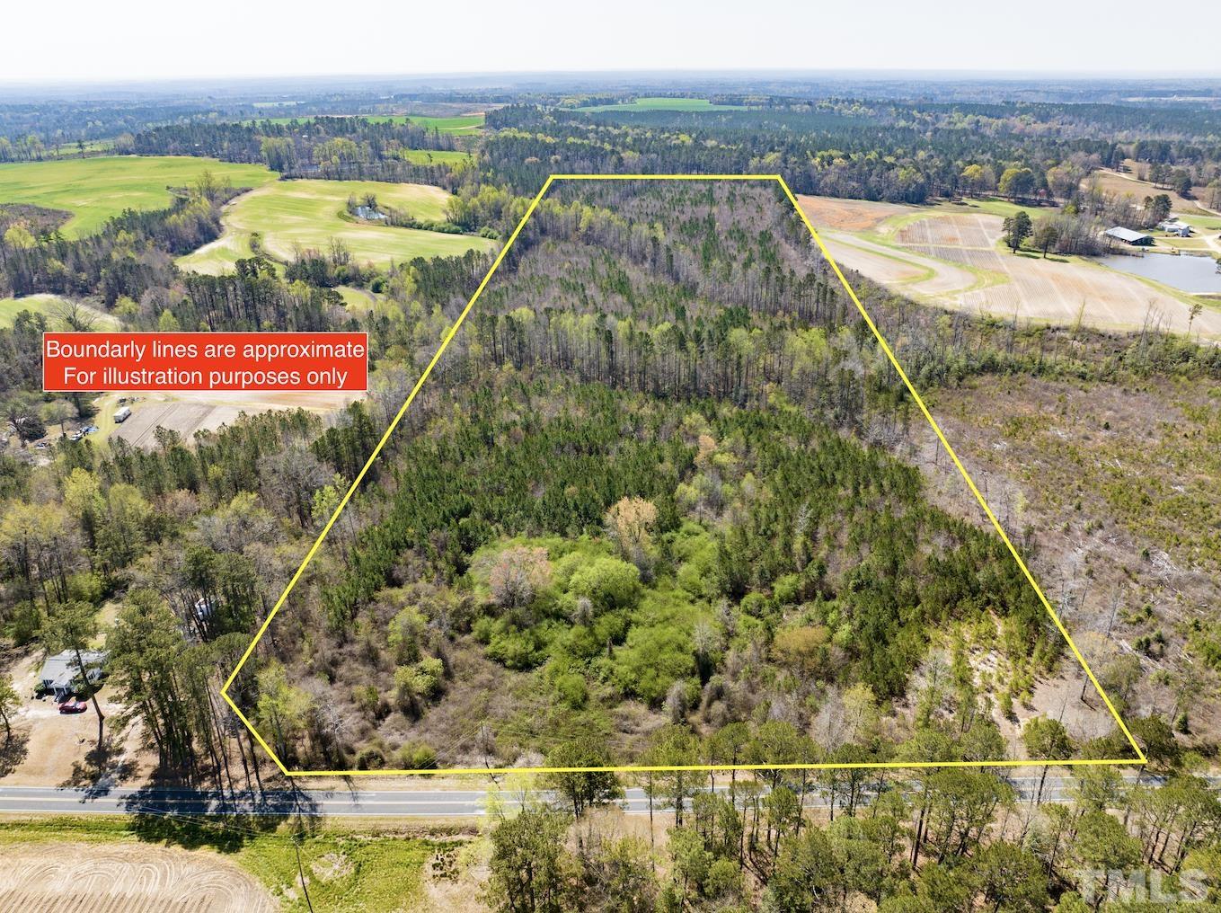 0 North McLean Chapel Church Road Bunnlevel, NC 28323 - Photo 2 of 16 a view of swimming pool with a yard and mountain view