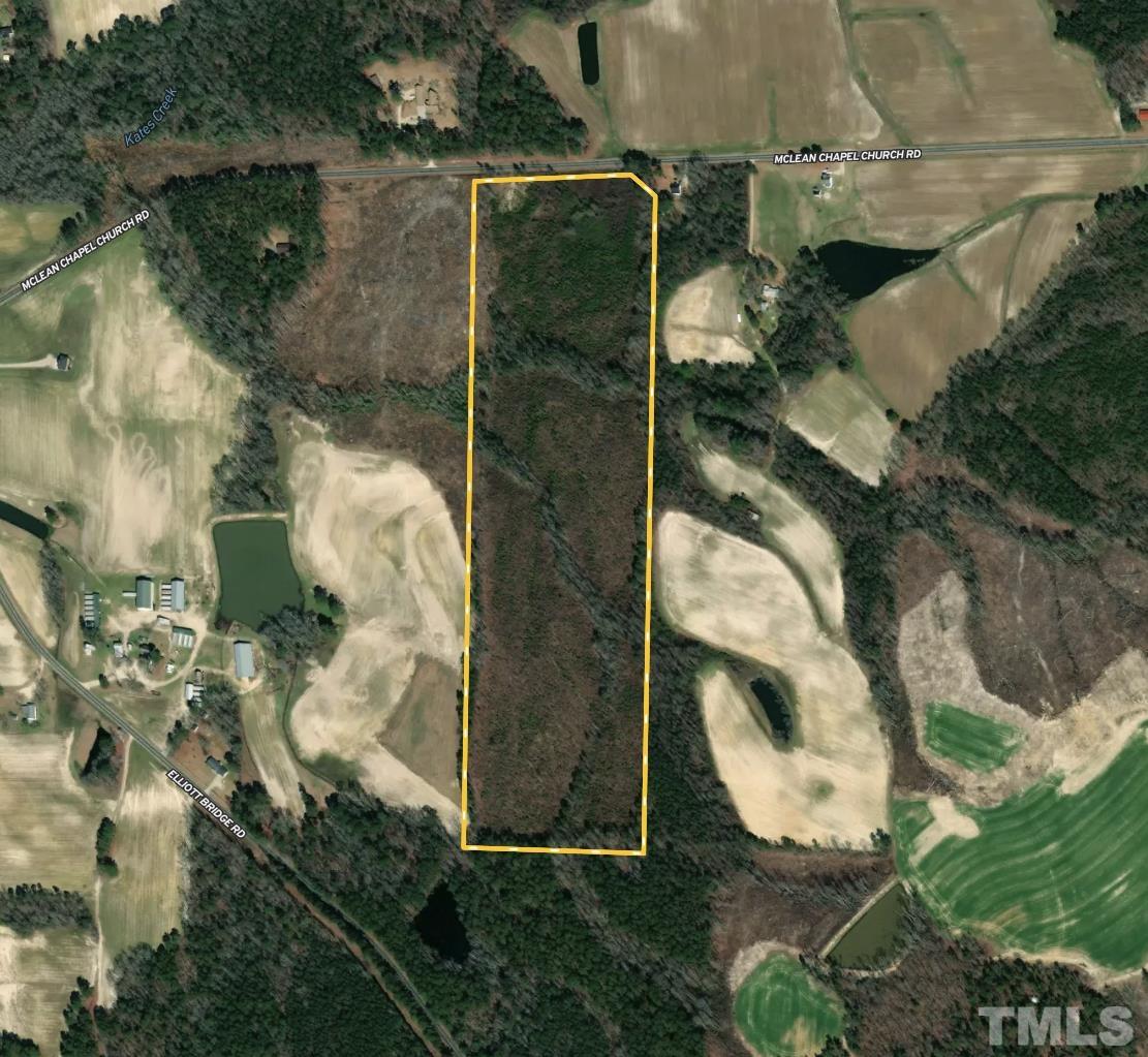 0 North McLean Chapel Church Road Bunnlevel, NC 28323 - Photo 5 of 16 an aerial view of a house with a yard