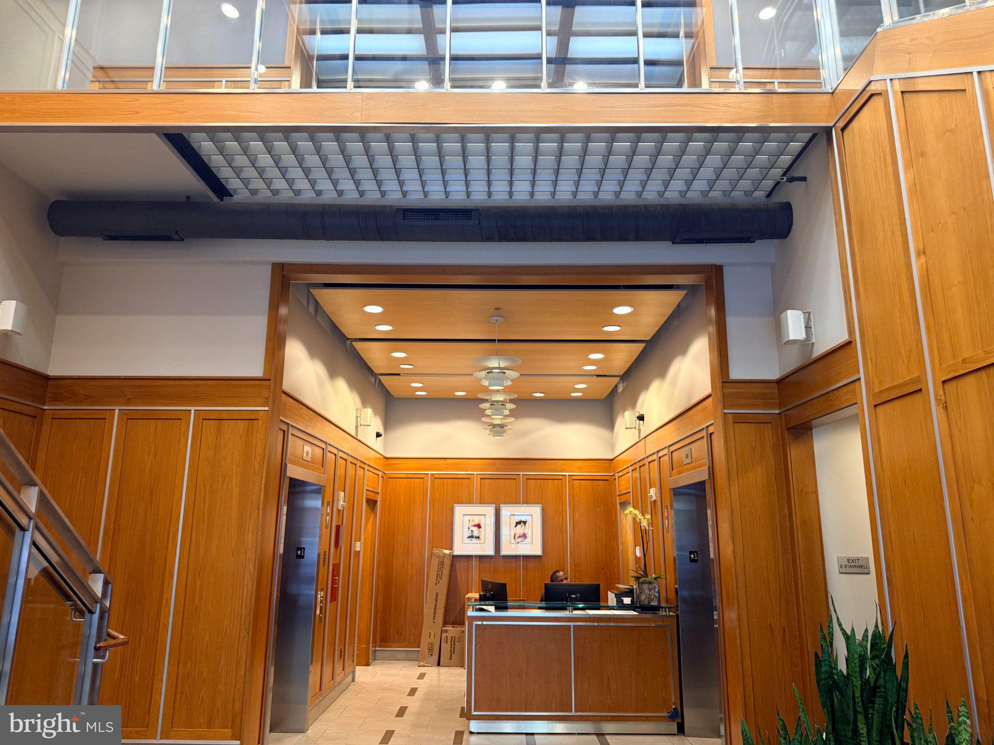 1133 14th Street Northwest, Unit 503 Washington, DC 20005 - Photo 2 of 29 Elegant lobby with modern design.