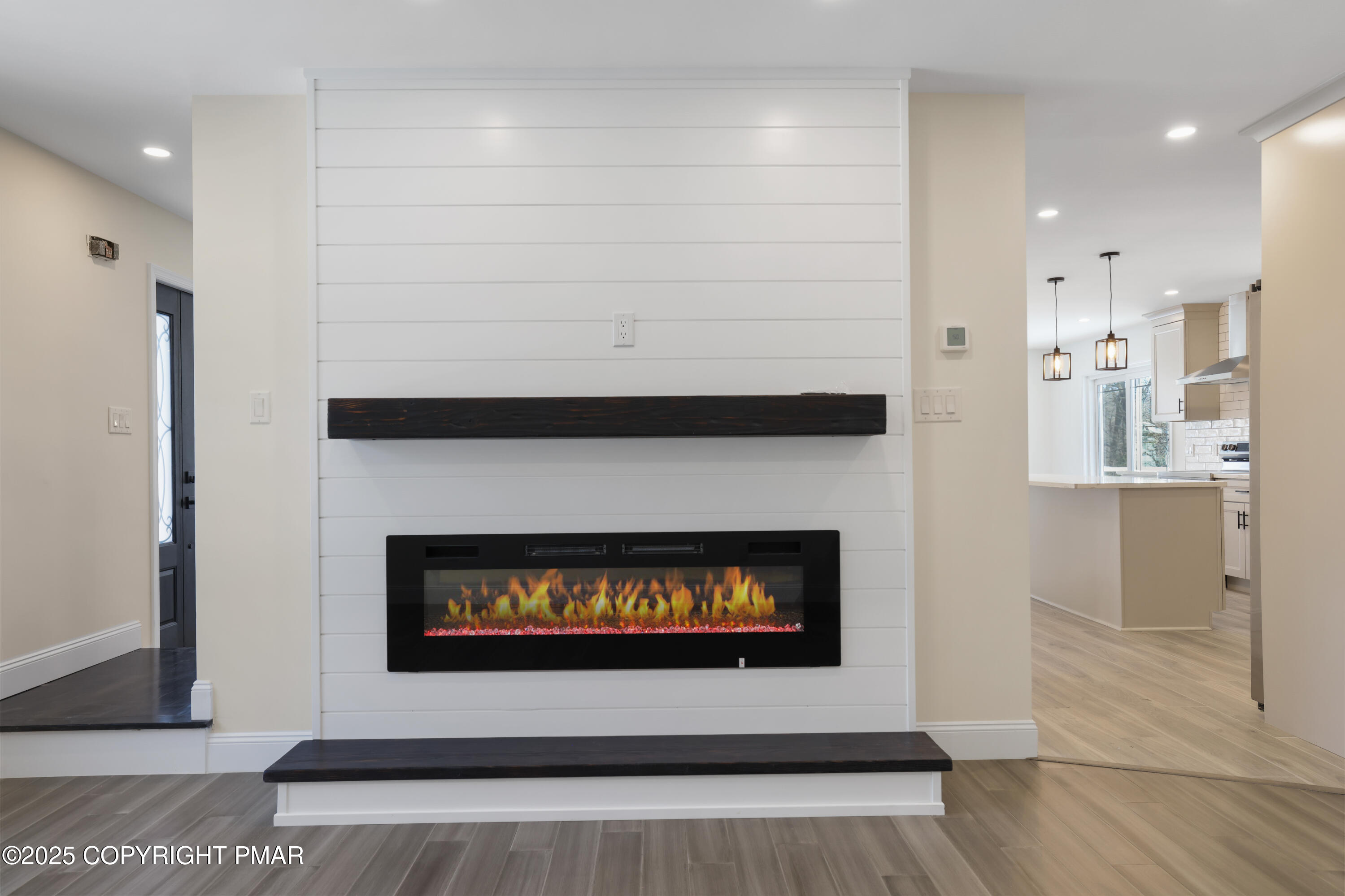 14 Stonegate Court Mount Pocono, PA 18344 - Photo 7 of 71 fire place with heat pump