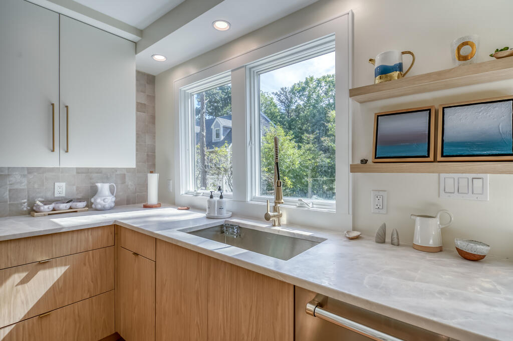99 The Boulevard Edgartown, MA 02539 - Photo 11 of 35 a kitchen with a sink and a window