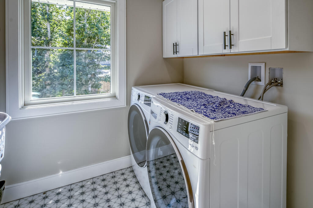 99 The Boulevard Edgartown, MA 02539 - Photo 20 of 35 a utility room with dryer and window