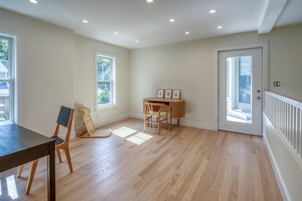 99 The Boulevard Edgartown, MA 02539 - Photo 21 of 35 a living room with furniture and a wooden floor