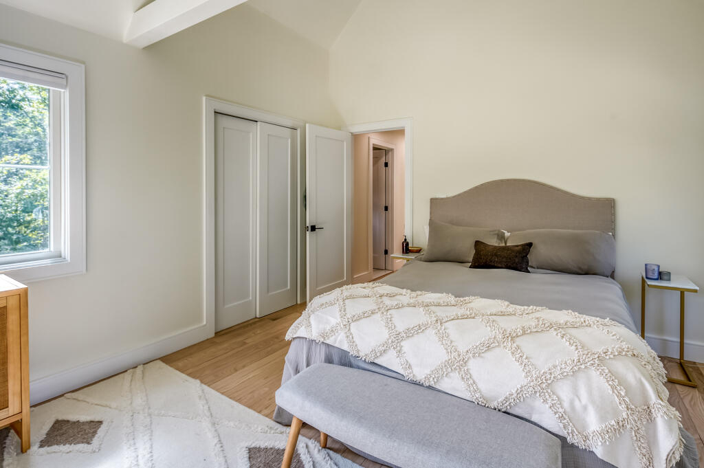 99 The Boulevard Edgartown, MA 02539 - Photo 24 of 35 a bedroom with a bed and a flat screen tv