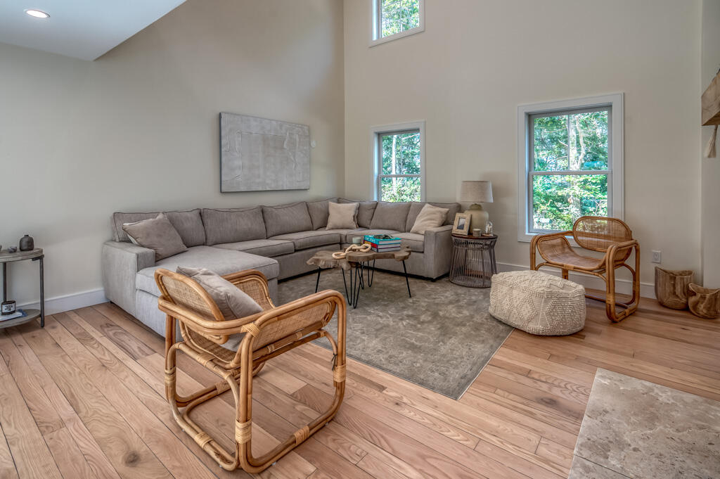 99 The Boulevard Edgartown, MA 02539 - Photo 4 of 35 a living room with furniture and a window