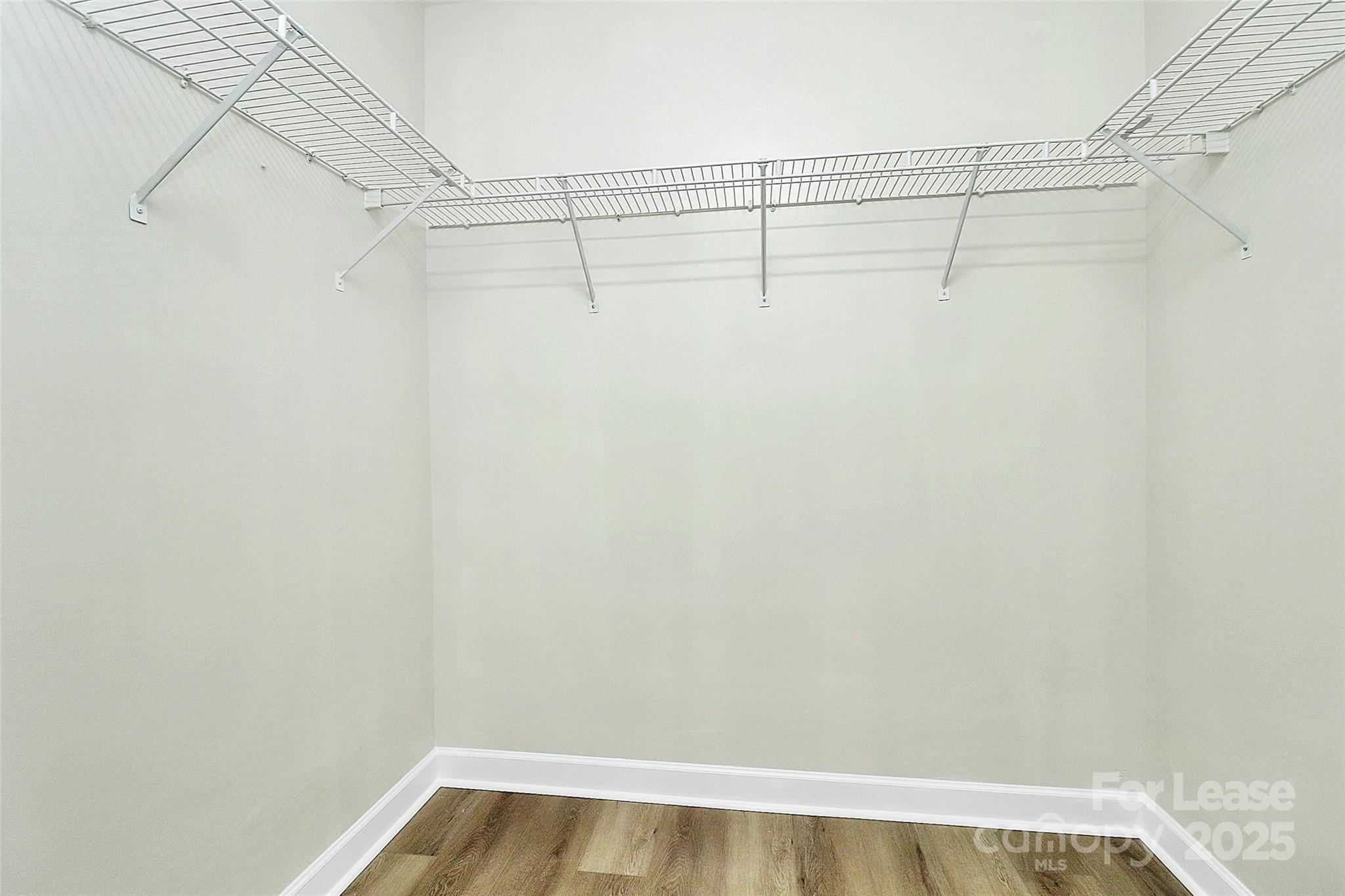 6320 Fresh Wind Avenue Charlotte, NC 28212 - Photo 19 of 31 a view of a room with racks on the wall