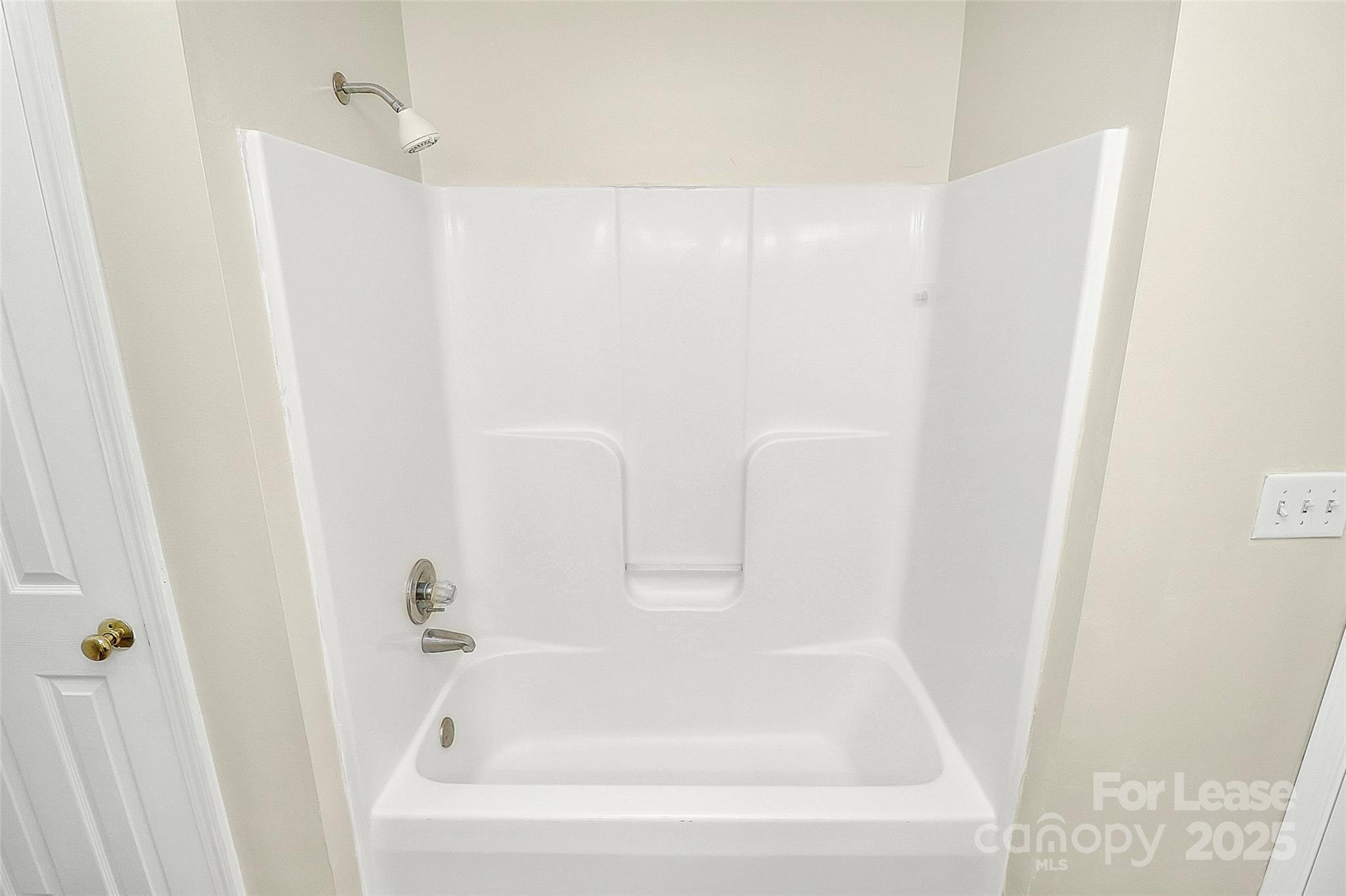 6320 Fresh Wind Avenue Charlotte, NC 28212 - Photo 21 of 31 a bathroom with a bathtub