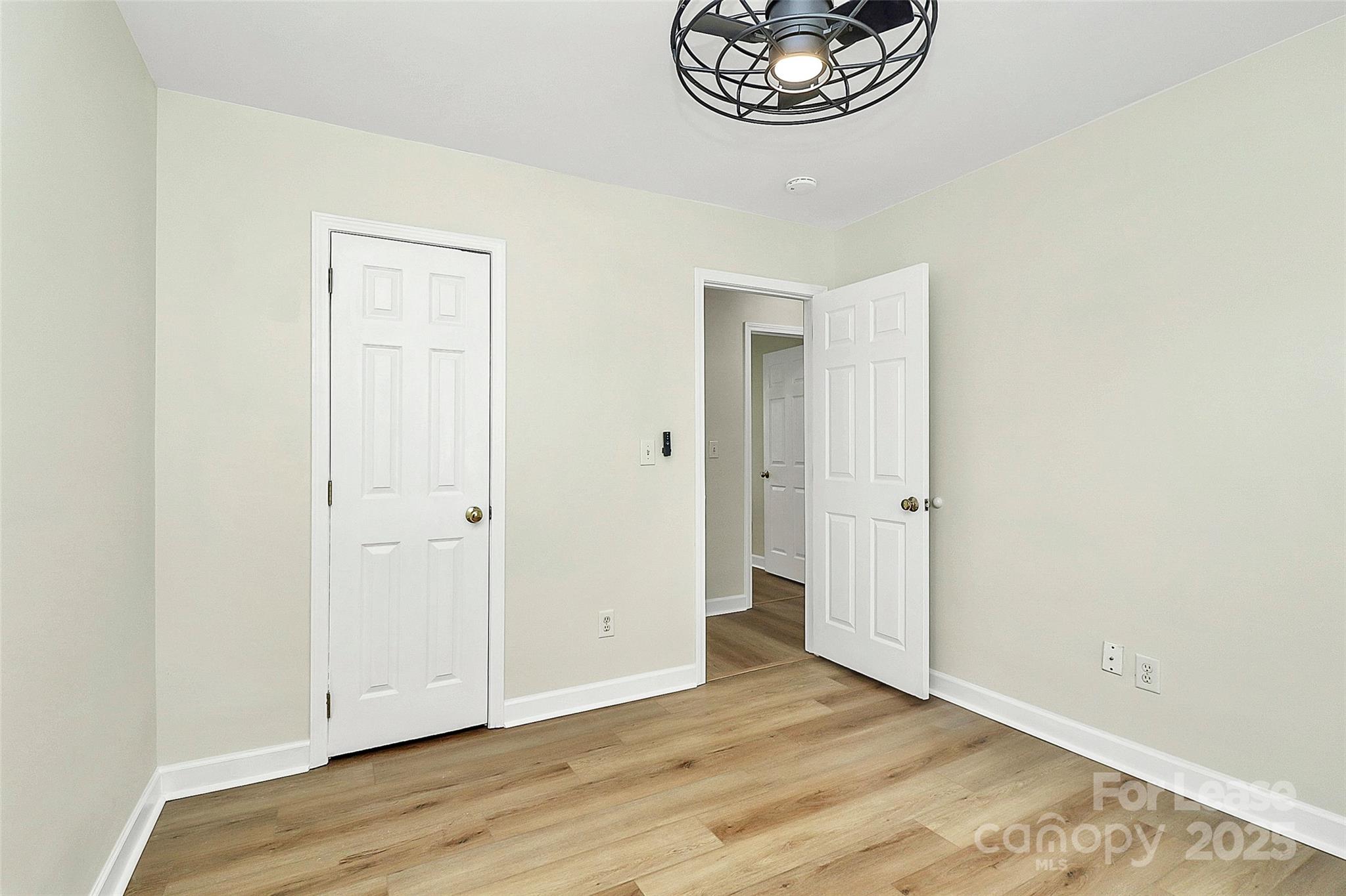 6320 Fresh Wind Avenue Charlotte, NC 28212 - Photo 23 of 31 a view of empty room with wooden floor