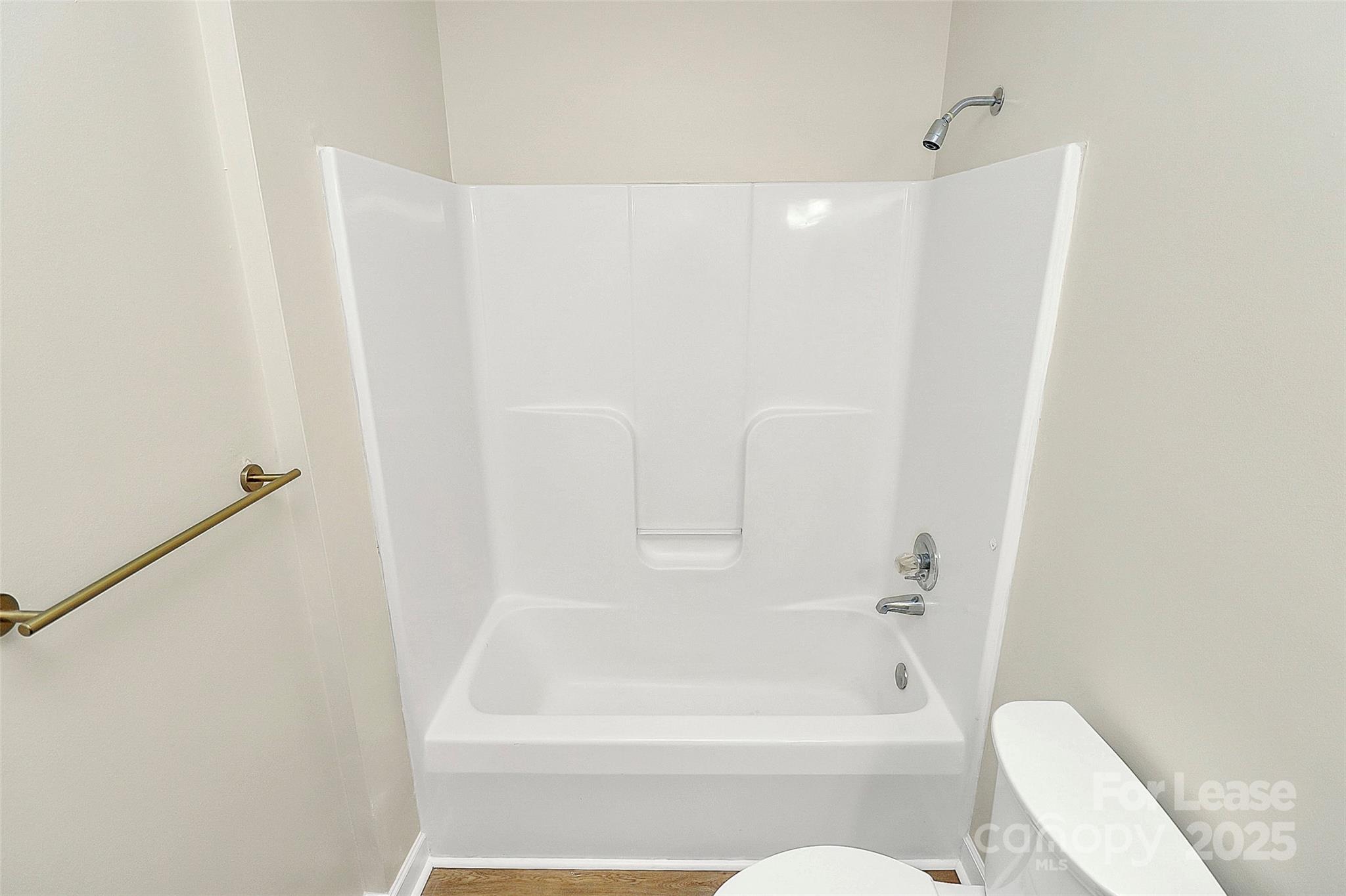 6320 Fresh Wind Avenue Charlotte, NC 28212 - Photo 27 of 31 a bathroom with a bathtub and a shower