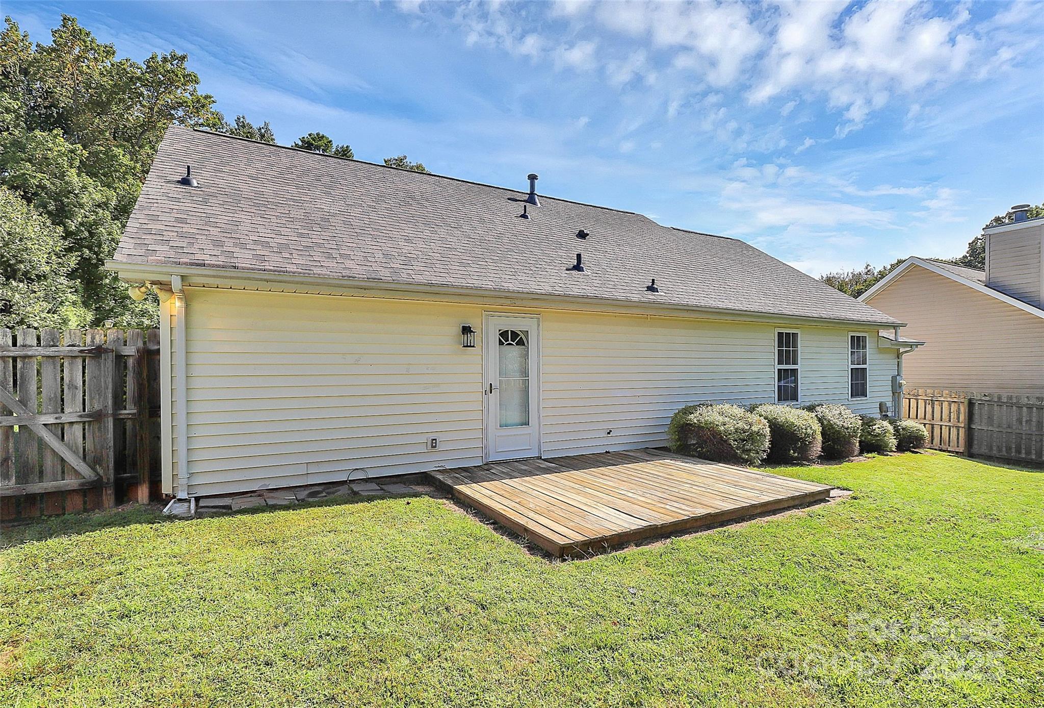 6320 Fresh Wind Avenue Charlotte, NC 28212 - Photo 28 of 31 a view of a backyard with a cabin