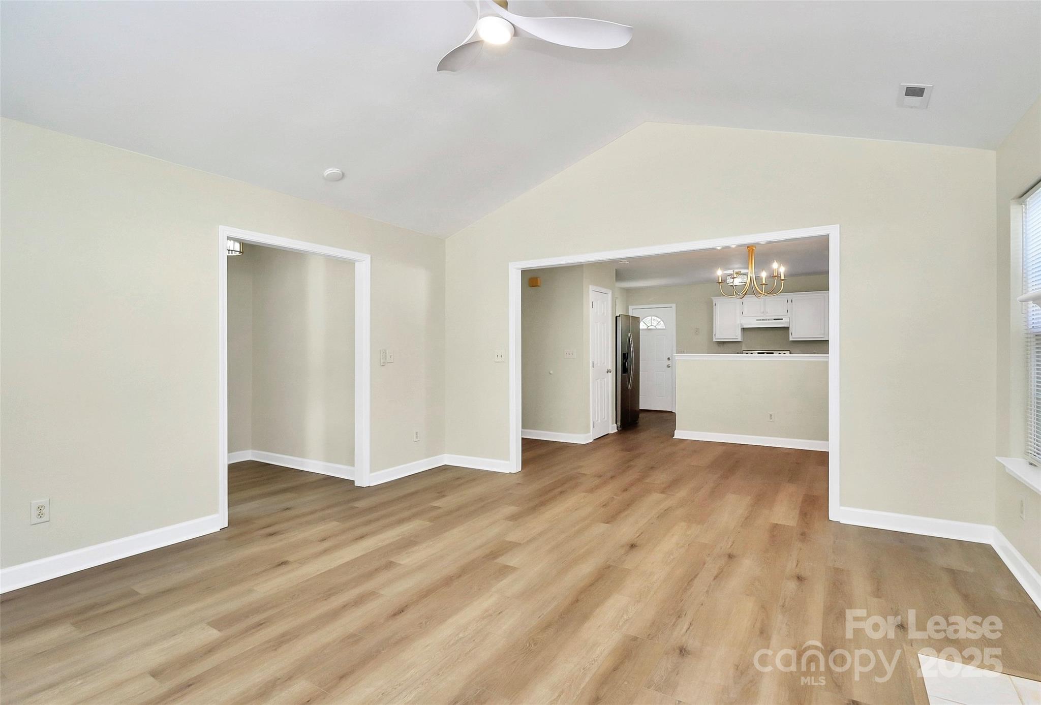 6320 Fresh Wind Avenue Charlotte, NC 28212 - Photo 8 of 31 a view of empty room with wooden floor