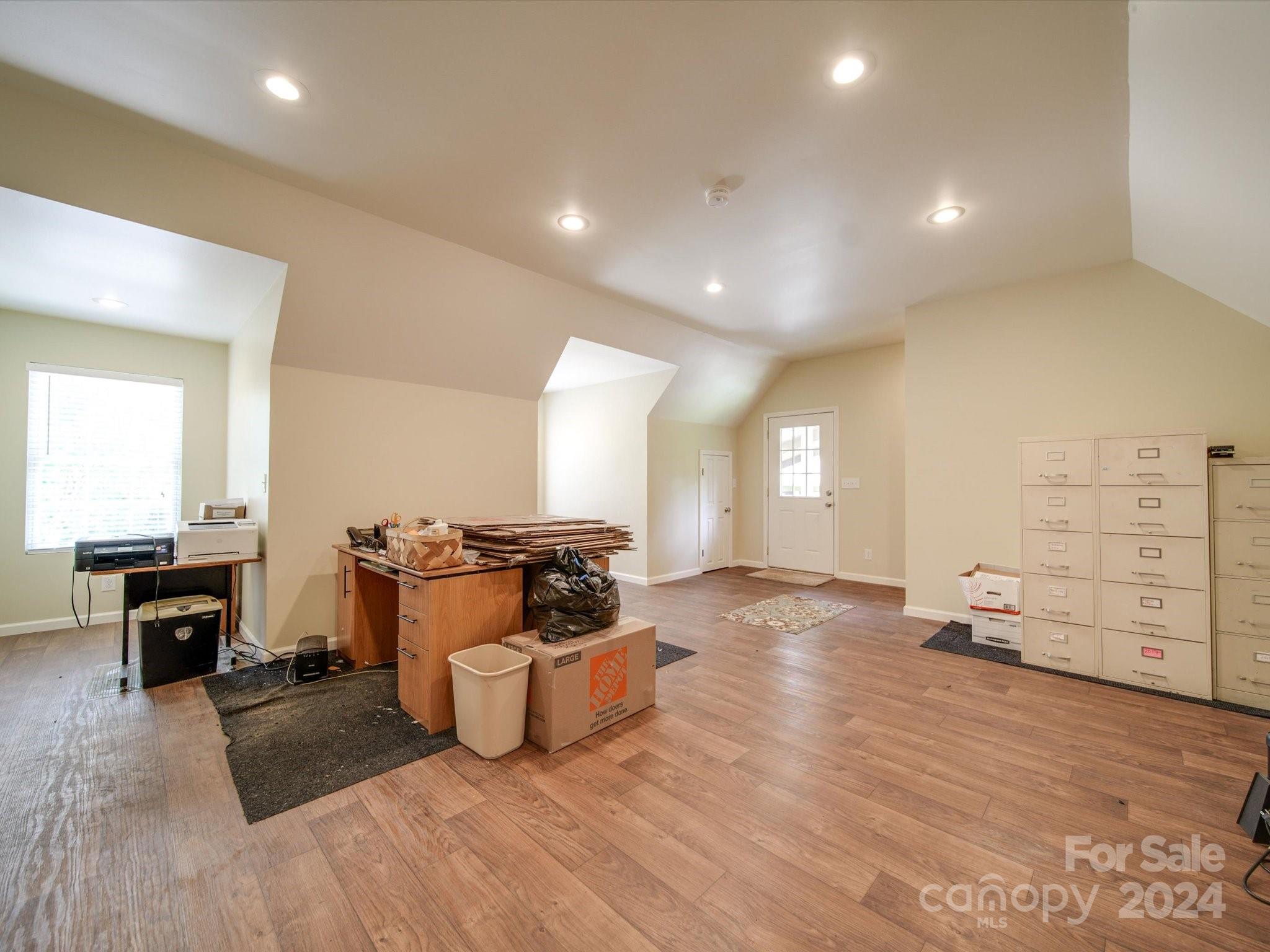 1557 Woodcroft Drive Fort Mill, SC 29708 - Photo 35 of 46 a living room with furniture and a fireplace