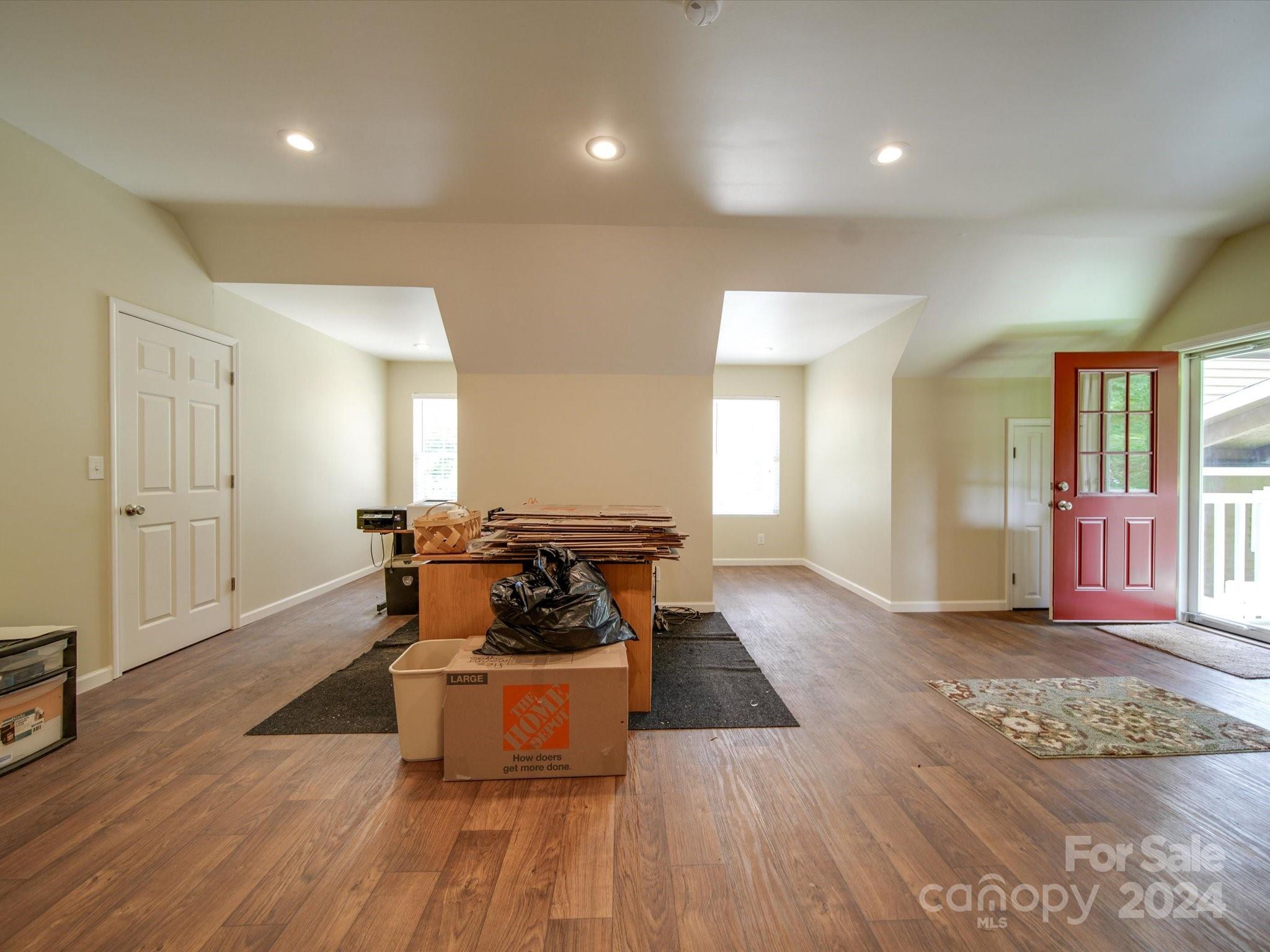 1557 Woodcroft Drive Fort Mill, SC 29708 - Photo 36 of 46 a living room with furniture and wooden floor