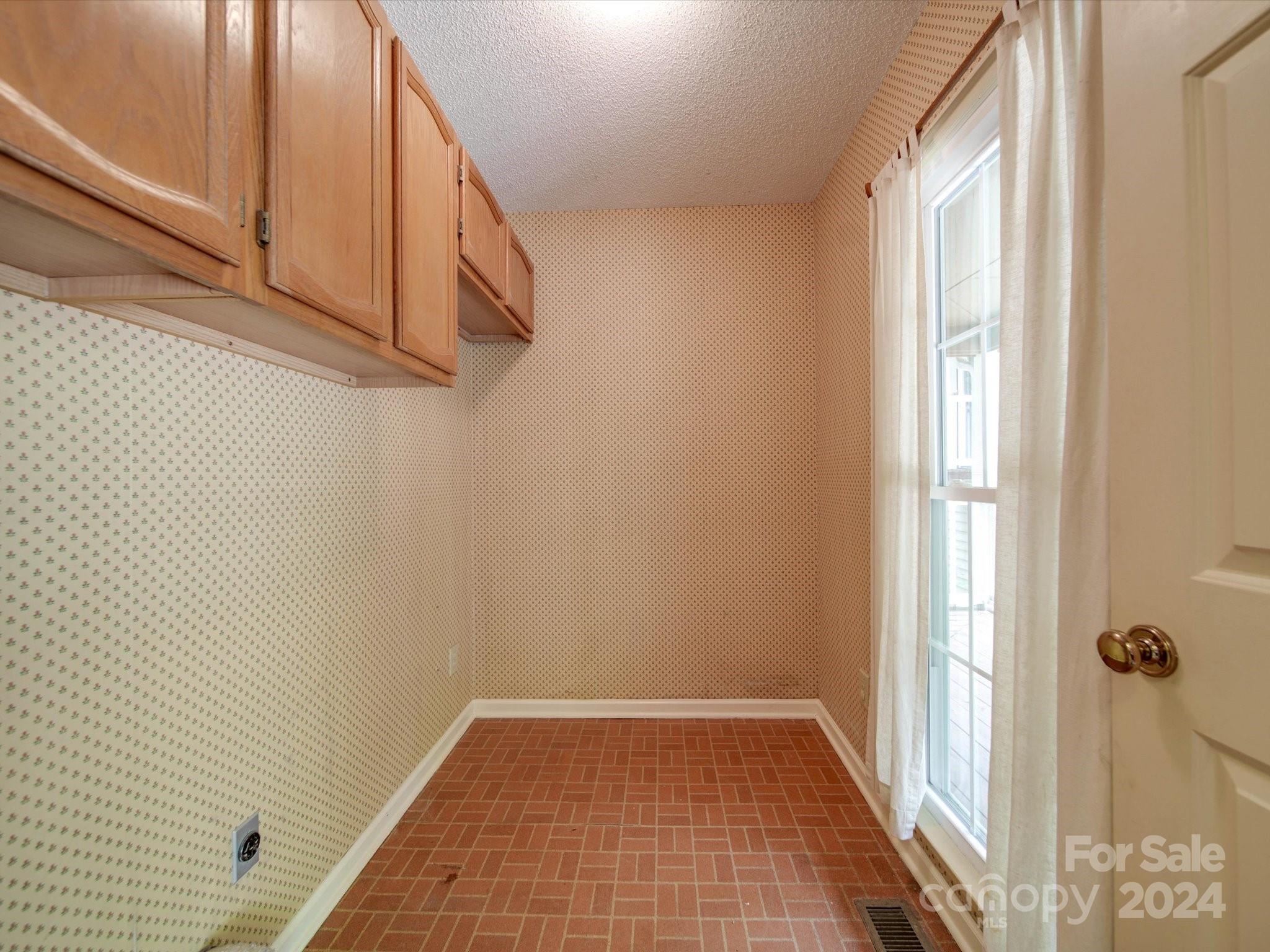 1557 Woodcroft Drive Fort Mill, SC 29708 - Photo 40 of 46 a view of a closet area with wooden floor