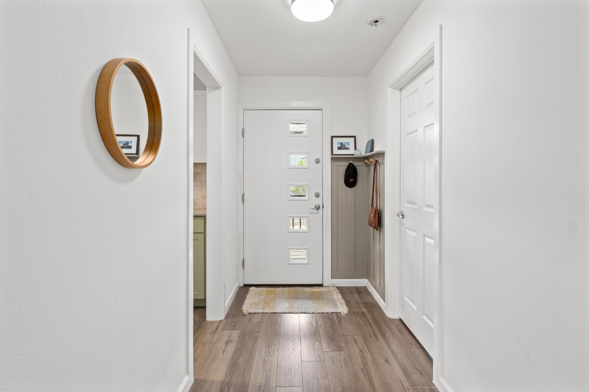 3604 Clawson Road, Unit 203 Austin, TX 78704 - Photo 11 of 37 a view of a hallway with wooden floor