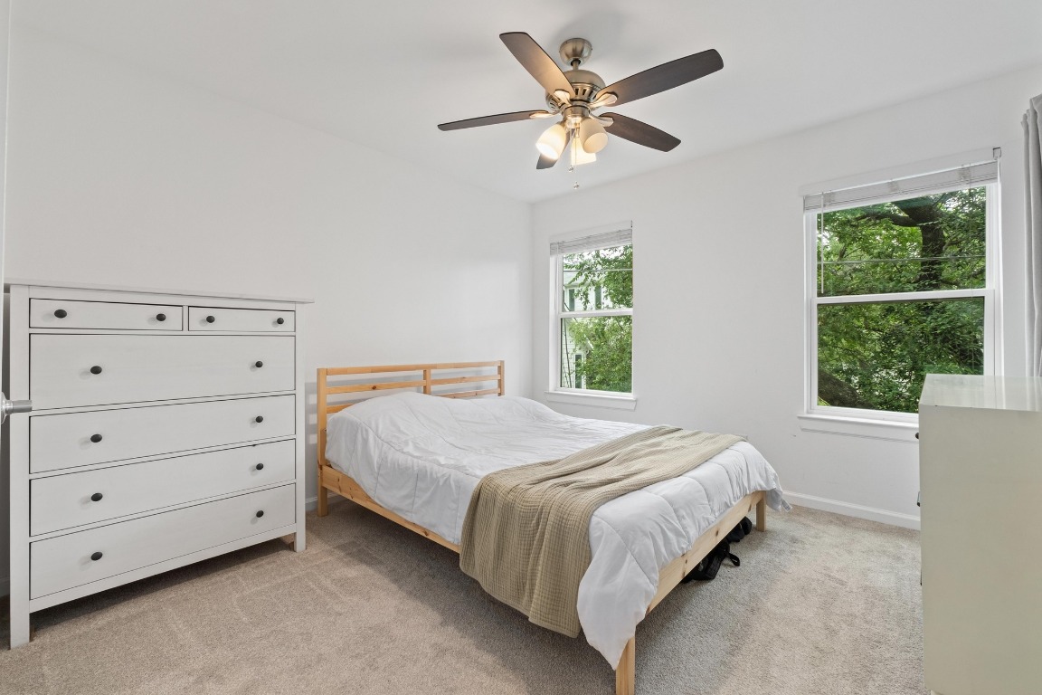 3604 Clawson Road, Unit 203 Austin, TX 78704 - Photo 12 of 37 a bedroom with a bed and a window