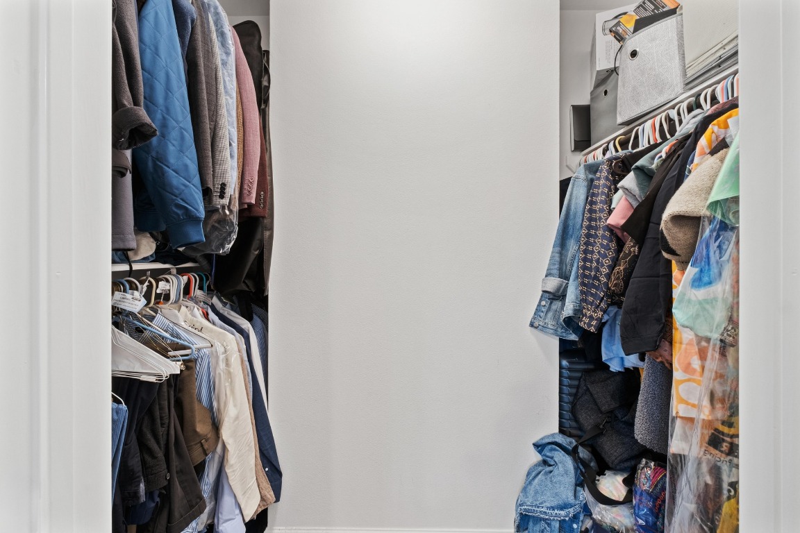 3604 Clawson Road, Unit 203 Austin, TX 78704 - Photo 24 of 37 a view of walk in closet with clothes and shoes